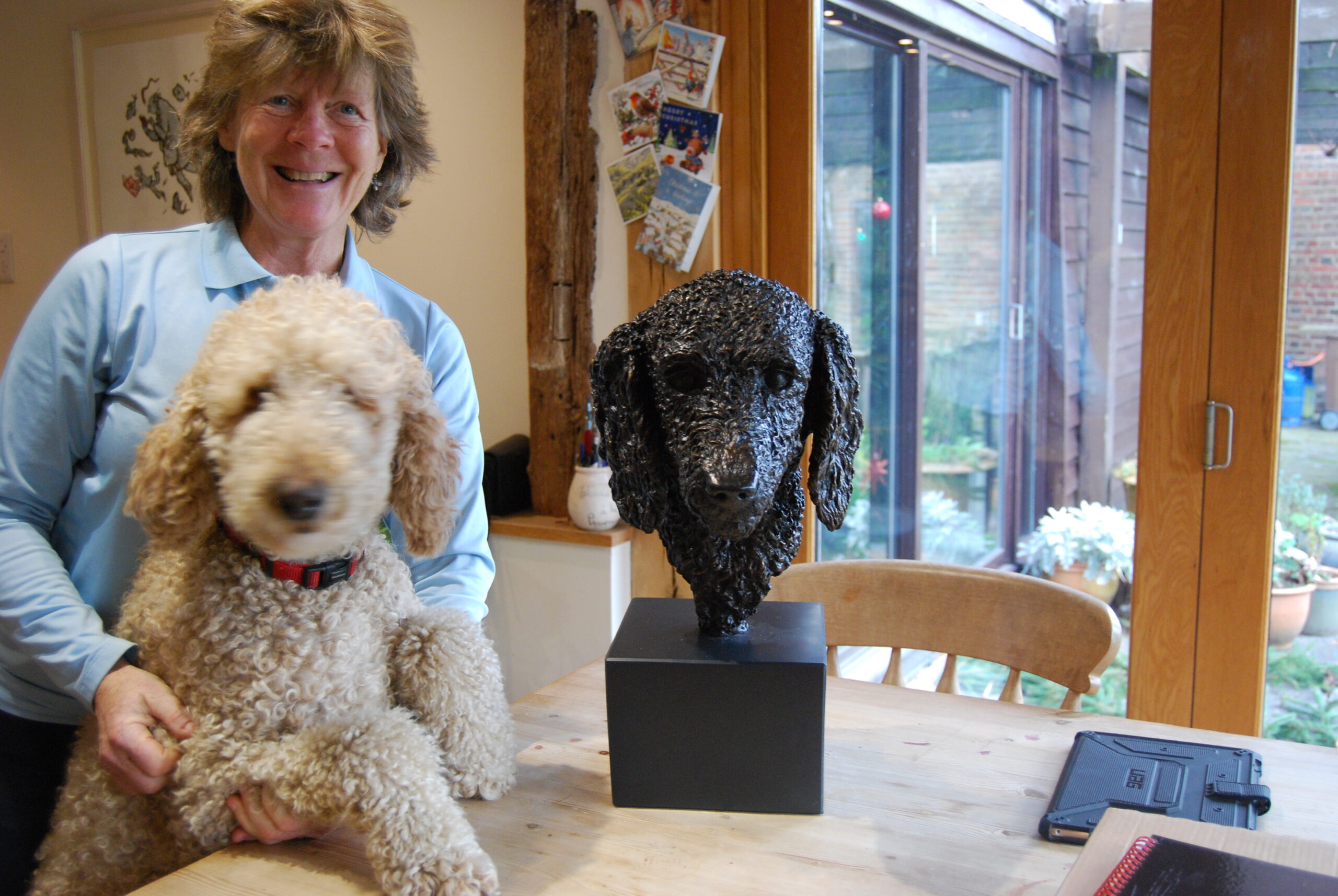 portrait sculpture of Porthos the Poodle made for a special birthday celebration a commission to the sculptressjoel