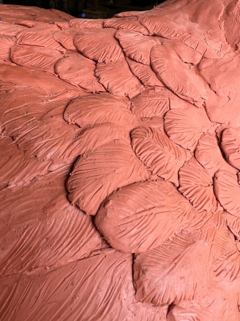 working on the feather details of the Goose Statue