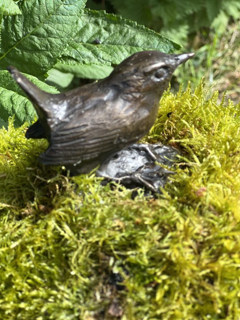 Wren on a Mossy Rock by Sculptress JOEL a lovely close up